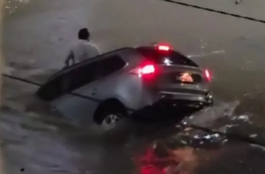 Enfermeiro é resgatado após carro cair em canal durante chuvas em Vitória da Conquista